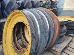 Track reconditioning + mid-rollers, idler & drive wheel reco