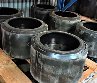 Track reconditioning + mid-rollers, idler & drive wheel reco