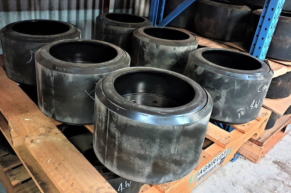 After - Track reconditioning + mid-rollers, idler & drive wheel reco