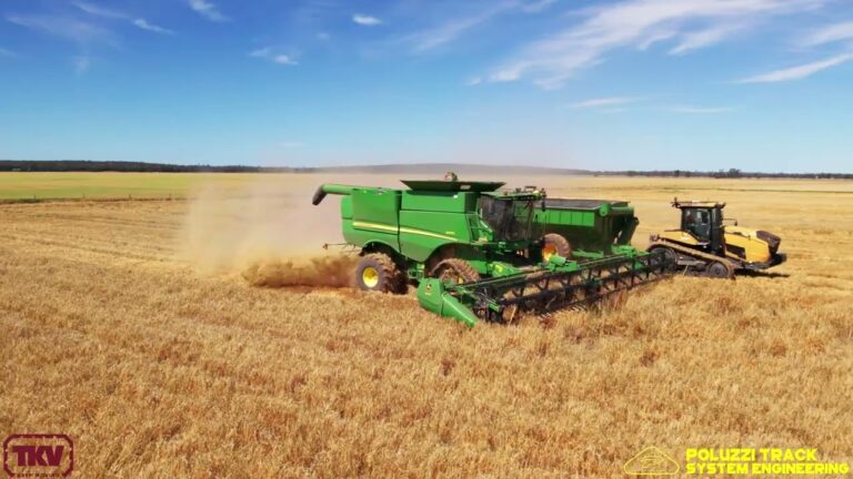 John Deere S670 wearing Poluzzi Bolt on Tracks